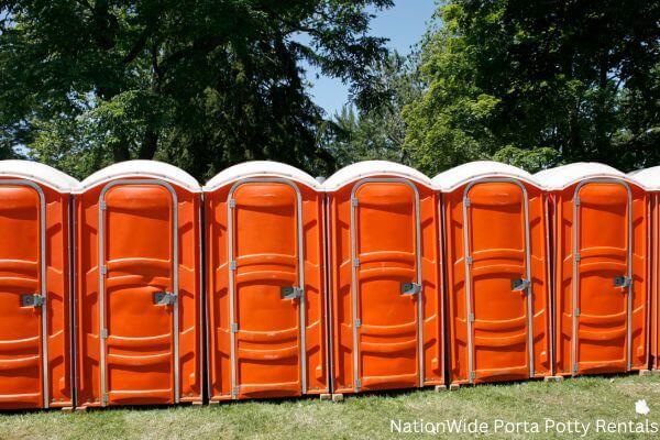 a lineup of clean and well-maintained portable loos for workers in Stevensville, MD